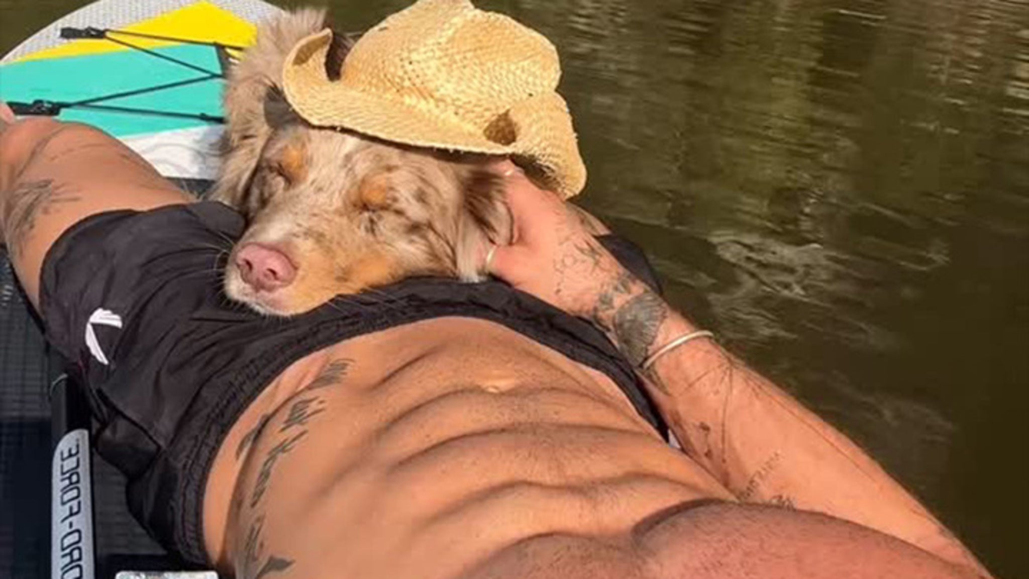 Guess the Shredded Star Cuddlin' With His Dog ... Ruff Life!