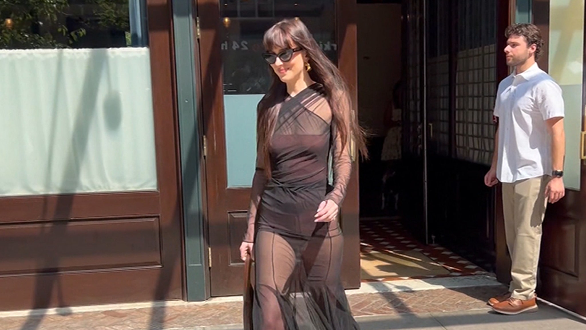 Dakota Johnson Steps Out After Reported Chris Martin Split in Sheer Outfit
