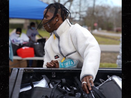 1222-travis scott donating toys houston1 crayton gerst