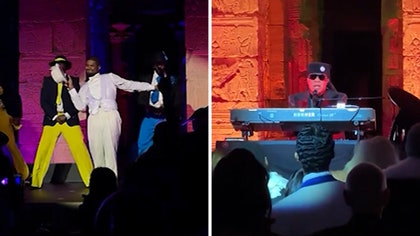 050625_usher_stevie_wonder_met_kal