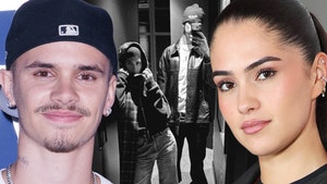 Romeo Beckham left, Kim Turnbull instagram getty