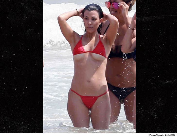 Kim and Kourtney Kardashian Go Bikini Wild PHOTO GALLERY :: 0424-kourtney-kardashian-beach-bikini-ffn-akmgsi-4