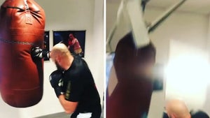 Tyson Fury Smashes Heavy Bag Until Ceiling Collapses, 'That Coulda Hurt Me!!!'