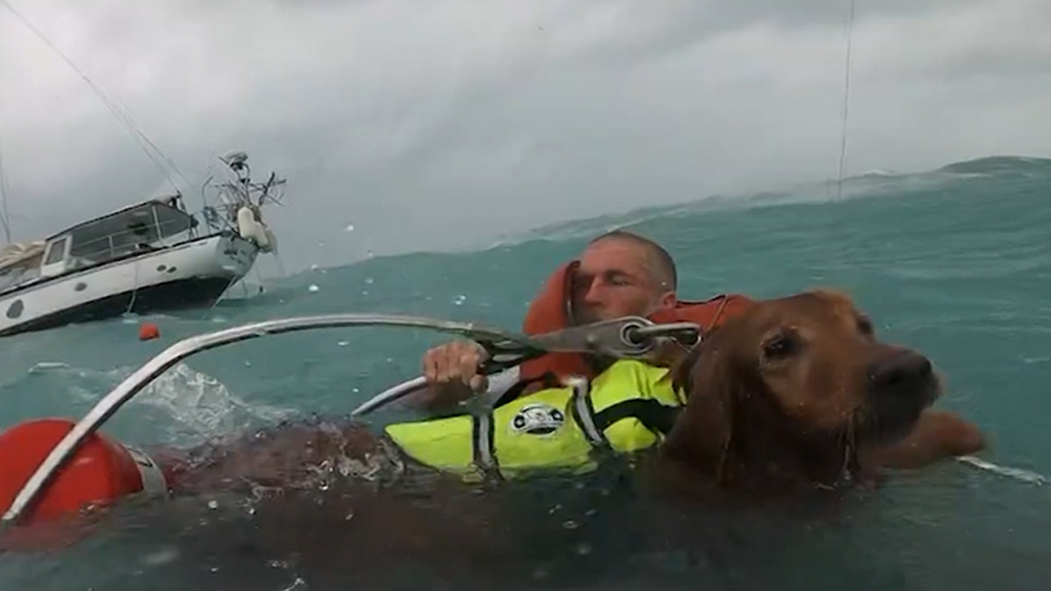 U.S. Coast Guard Saves Man, Dog in Dramatic Video After Hurricane Damages Boat