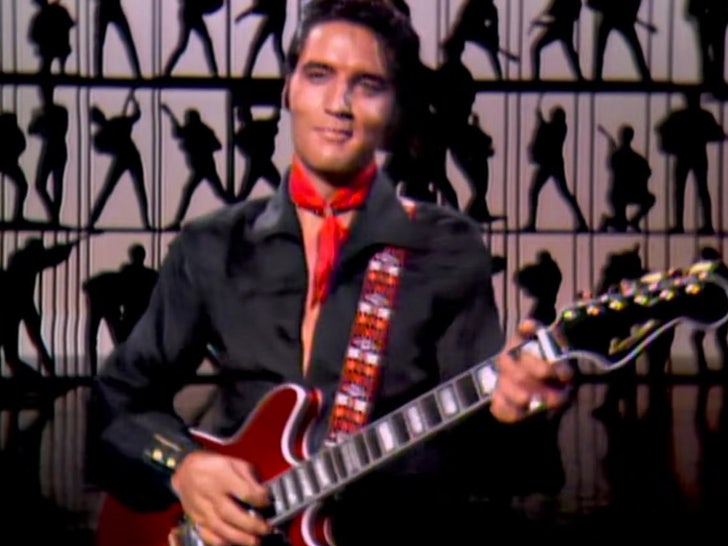 Elvis Presley jewelry, guitar up for auction