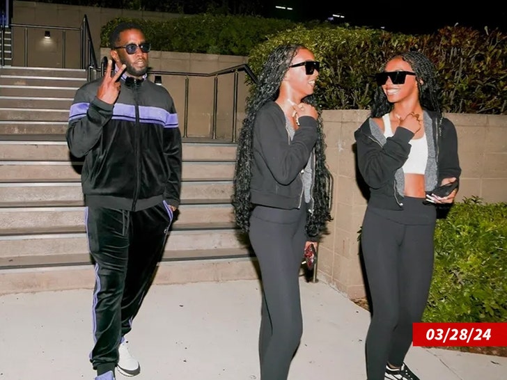 p diddy with daughters