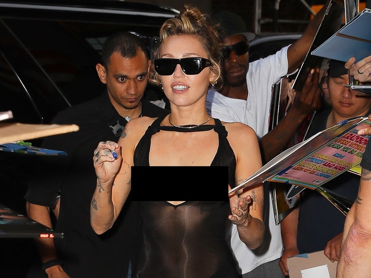 Miley Cyrus Turns Heads in Sheer Black Gown After NYC Performance