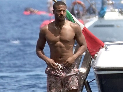 0716_michael_b_jordan_boat_italy_shirtless_primary