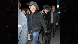 Jeff Bezos In A Cowboy Hat Holding Hands With Lauren Sanchez In A Big Fur Hat