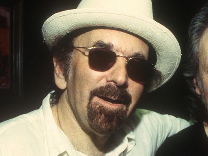 Barry Goldberg Wearing A White Hat And Sunglasses