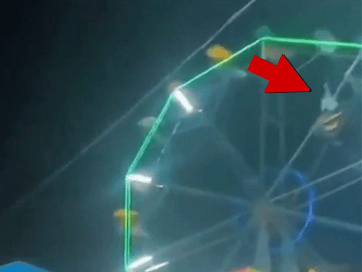 100825_man_hangs_ferris_wheel_fall_primary