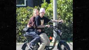 Justin Bieber Rides His Bike With Hailey Holding on Tight