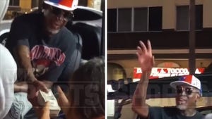 Dennis Rodman Hands $500 To Woman With Disability Outside Strip Club