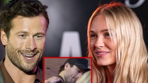glen-powell-michelle-randolph-getty-2