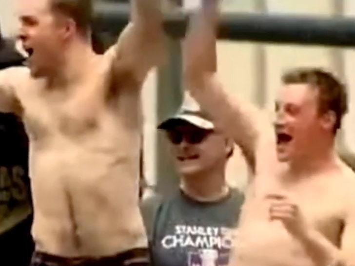 Avalanche Stars Cale Makar, Devon Toews Strip Off Shirts At Stanley Cup Title Parade.jpg