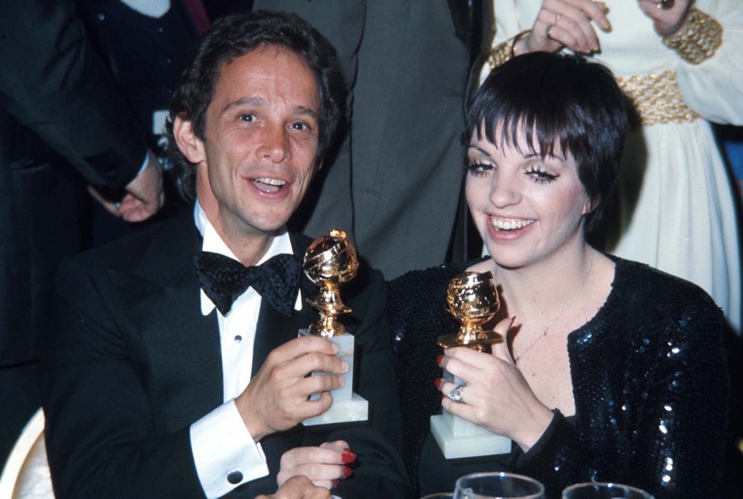 1973 --  Performer Liza Minnelli sits with performer Joel Grey at the Golden Globe Awards. Minnelli and Grey each received a Golden Globe for their roles in Bob Fosse's 