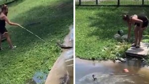 Woman Enters Alligator Pit with Son to Get Wallet, Insane Video