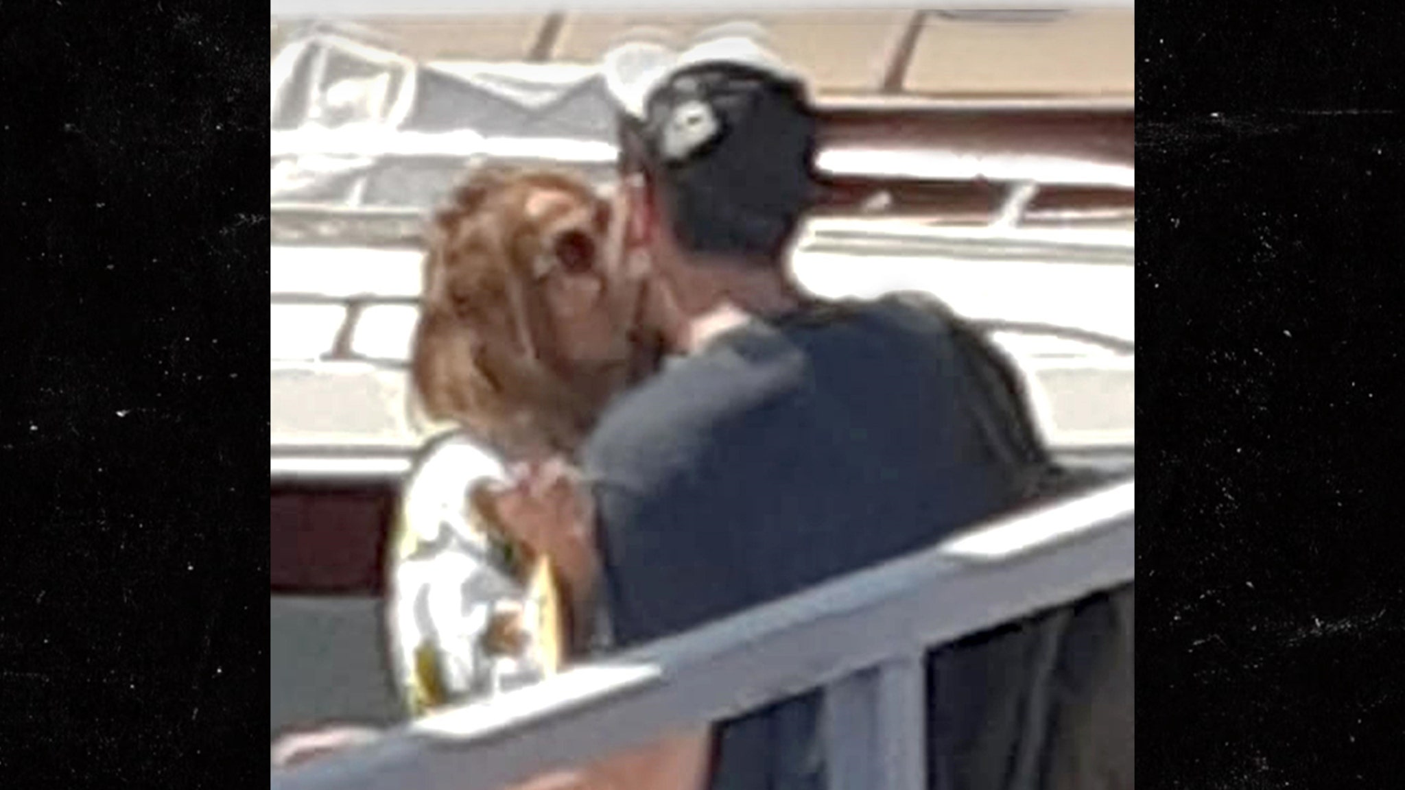 J Lo &amp; Ben Kiss on a Dock in Naples Italy