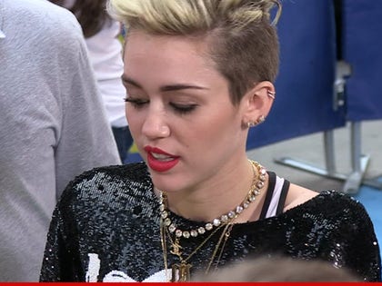 1123-miley-cyrus-tmz