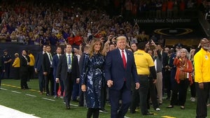 President Trump Cheered At National Championship Game, Hangs with Vince Vaughn