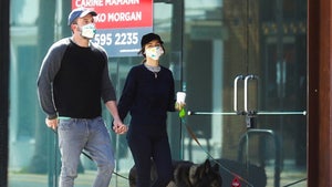 Ben Affleck & Ana de Armas Wear Masks to Take Dogs for Walk