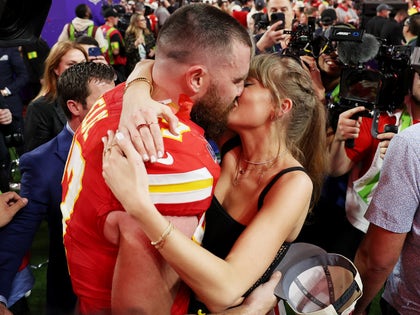 Taylor Swift And TRavis Kelce Kissing At Super Bowl LVIII