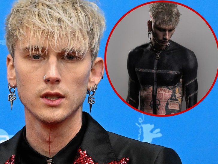 Machine Gun Kelly Debuts Higher Physique Blackout Tattoo For Religious ...