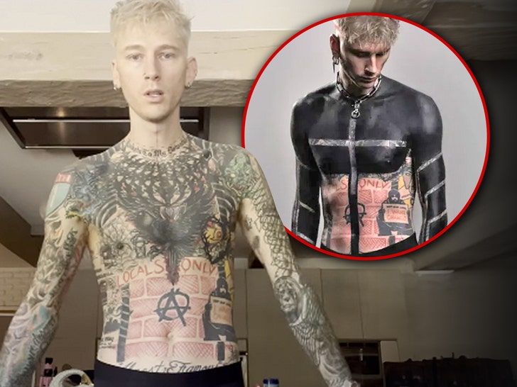mgk tattoos blacked out