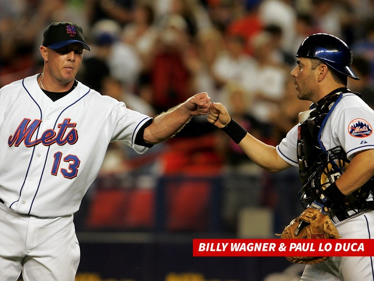 CORRECTS SPELLING TO WAGNER** New York Mets relief pitcher Billy Wagner,  left, receives a high-five from catcher Paul Lo Duca after defeating the  Florida Marlins 6-5 during a baseball game Wednesday, Aug.2