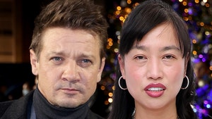 jeremy renner yi zhou main getty