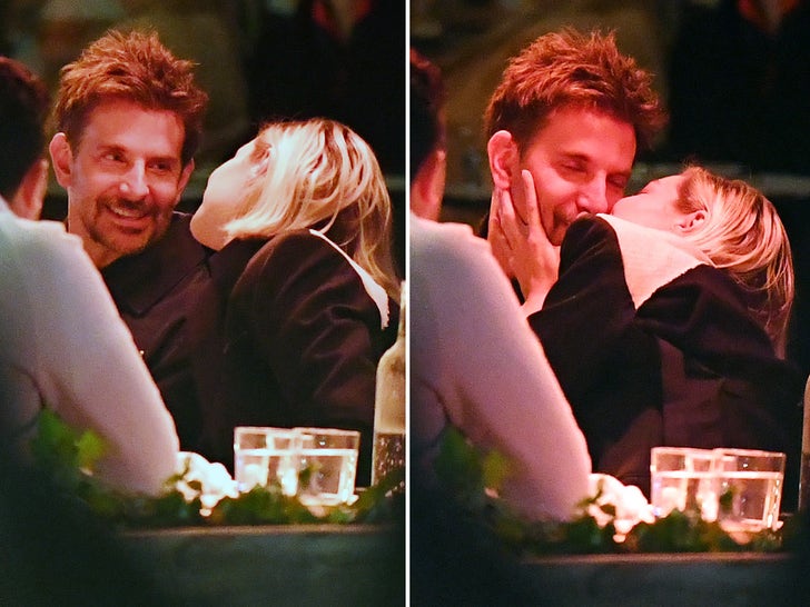 Model Gigi Hadid and actor Bradley Cooper kiss passionately during NYC dinner