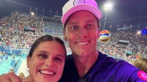 ilon maher and tom brady at olympics beach volleyball