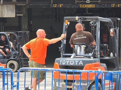 taylor swift travis kelce wedding workers outside msg splash news 1