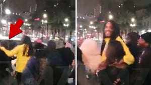 Waka Flocka Flame Saves Selfie-Taking Fan From Being Hit By Car