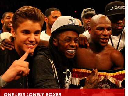 0506_bieber_mayweather_gallery_launch_getty