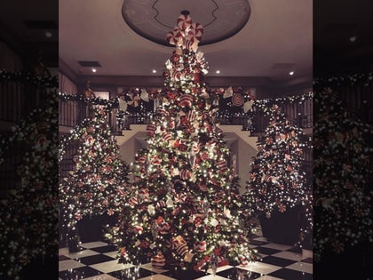 1216-kim-kardashian-candy-cane-lane-instagram