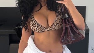 0813-Kylie-Jenner-Animal-Print-Swimwear-Guess-Who-PRIMARY
