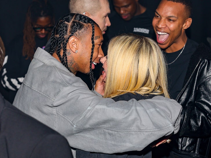 Avril Lavigne and Tyga kiss at Paris fashion week