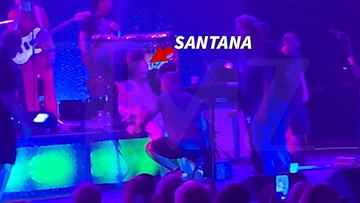 Guitarist Carlos Santana passes out on stage during U.S. concert