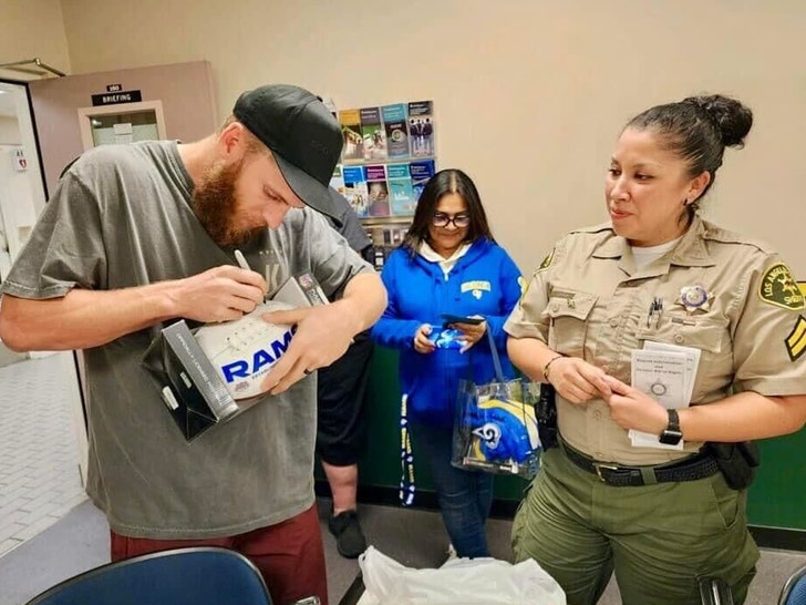 cooper kupp signing shoes for sheriffs
