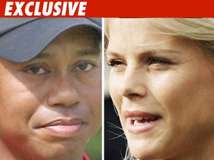 TIger Woods and wife Elin