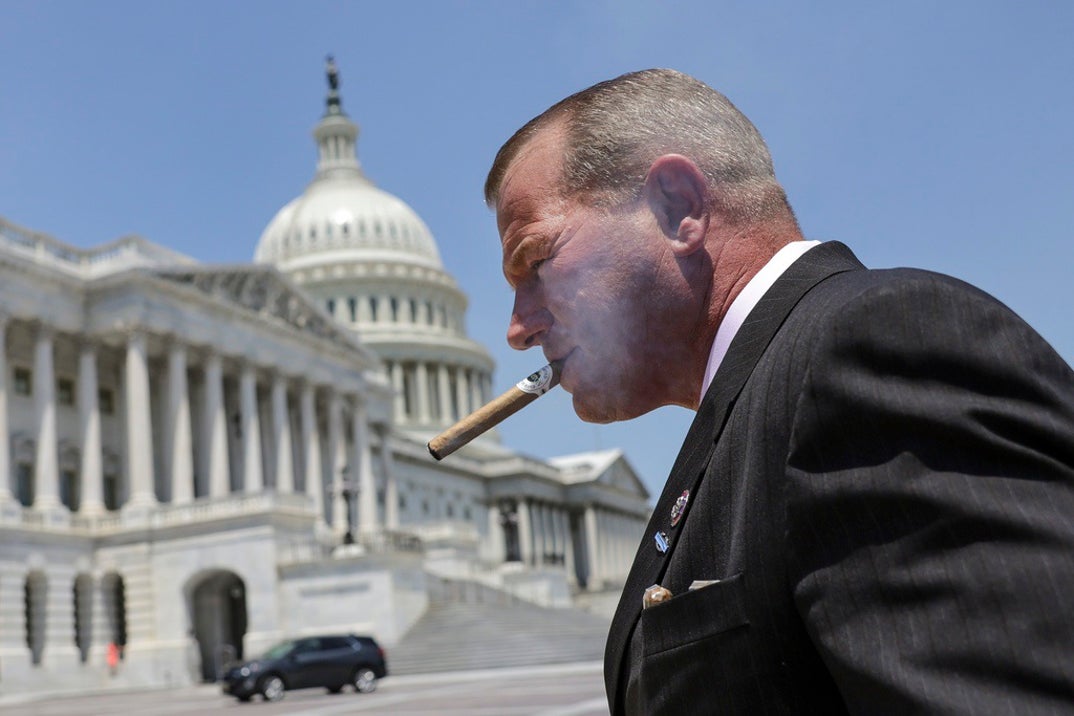 Representative Troy Nehls Smoking Cigars 2