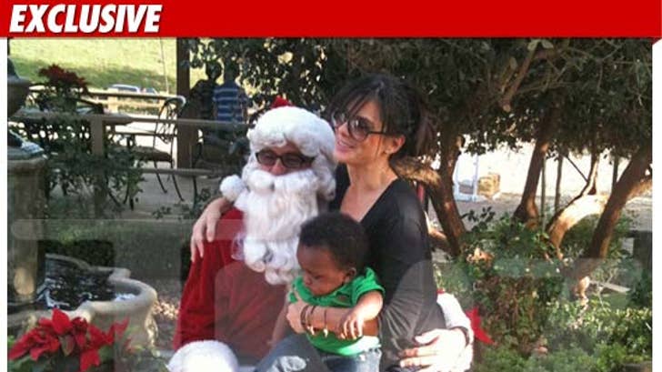 1223_sandra_santa_TMZ_EX