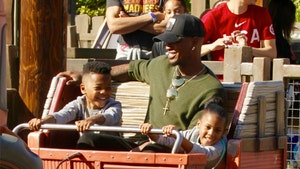 Ne-Yo Can't Stop Smiling on Family Trip to Disney's California Adventure