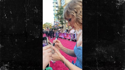 101223_taylor_swift_movie_tattoo_kal