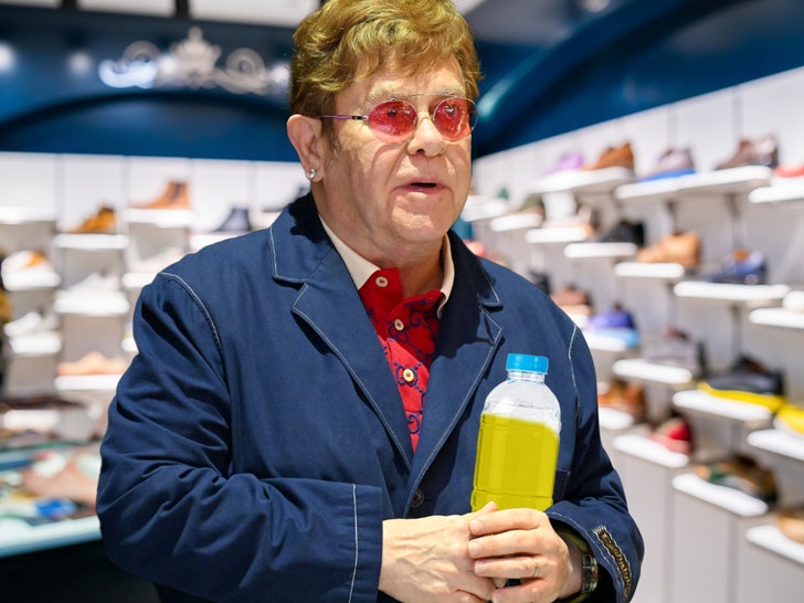Elton John Pees in Plastic Bottle at Store in France, Owner Claims