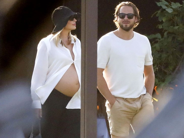 Margot Robbie Shows Baby Bump On Sardinian Vacation With Hubby Tom Ackerley