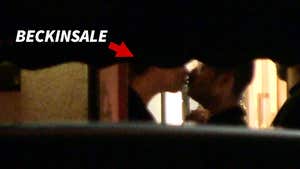 Kate Beckinsale Kisses Date as They Leave L.A. Restaurant