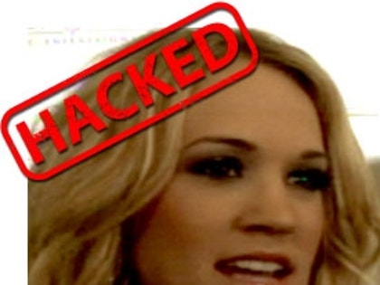 0605_carrie_underwood_hacked-1