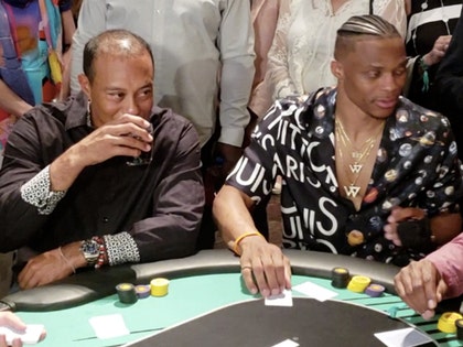 0525-toger-woods-splash-01